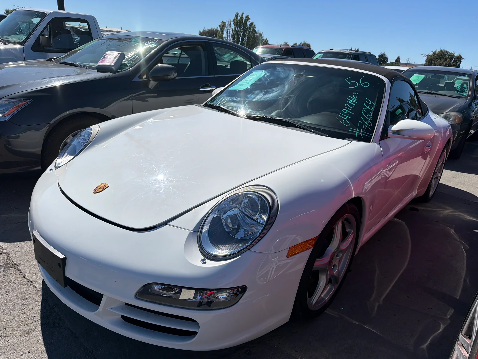 Auction lot photo of a white Porsche 911 convertible